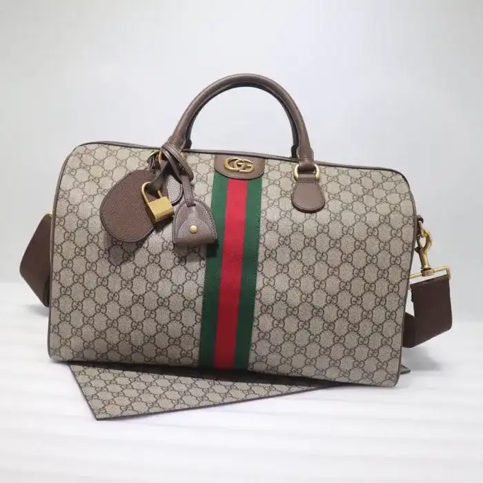 Discover elegance with the Gucci Savoy Medium Duffle Bag. Perfect for any journey, it adds a touch of luxury to your adventures. ✨👜❤️ https://tinyurl.com/2ajh4kv2