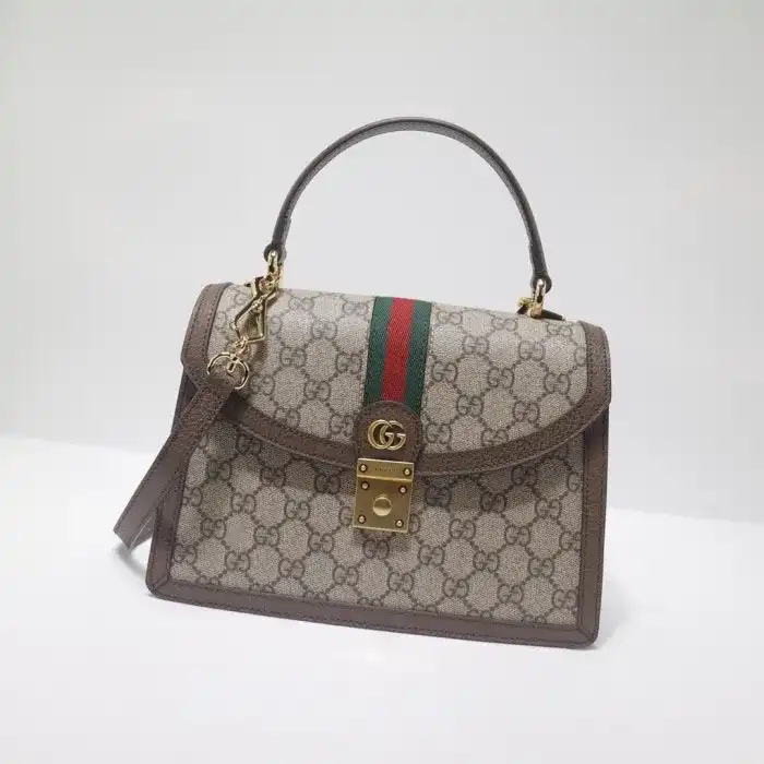Embrace timeless elegance with the Gucci Ophidia Small Top Handle Bag. Perfect for any occasion, it adds a touch of charm to your style. 👜✨💖 https://tinyurl.com/245dsdx8