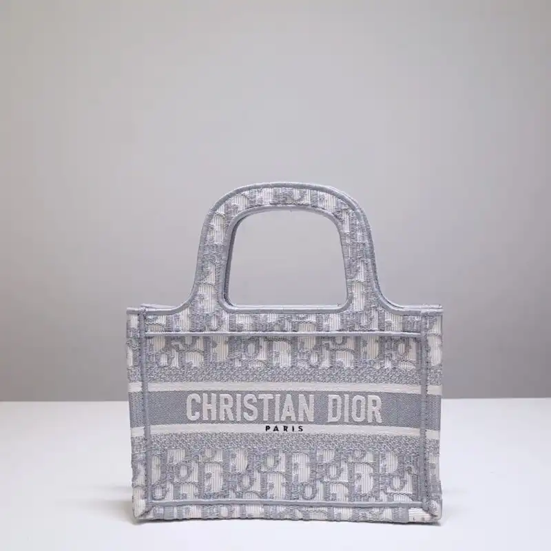 Discover elegance with the Dior Tote Book Mini in soft grey. Perfect for any occasion, it adds a touch of charm to your day. 💖✨👜 https://tinyurl.com/26wl8x3y