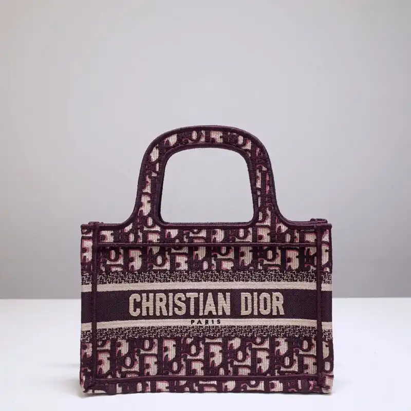 Discover the elegance of the Dior Tote Book Mini in radiant red. Perfectly charming for every occasion! 🌹✨👜 https://tinyurl.com/2a982e8k