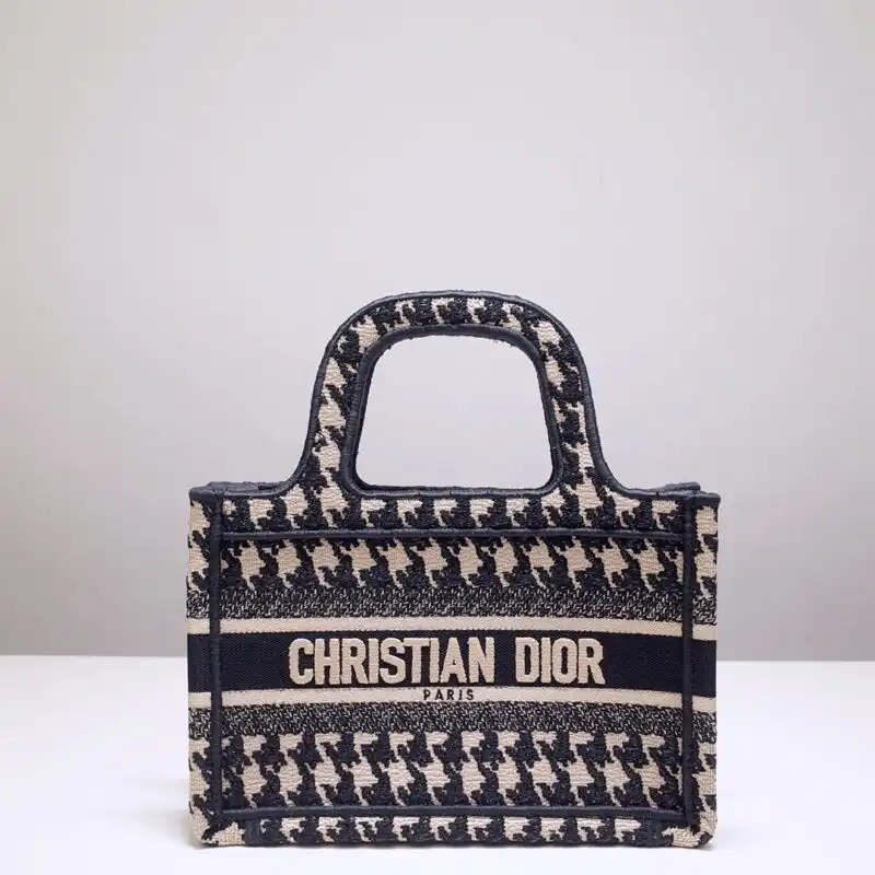 Discover elegance with the Dior Tote Book Mini in houndstooth. A charming companion for your daily adventures! 👜✨💖 https://tinyurl.com/258bkpzg