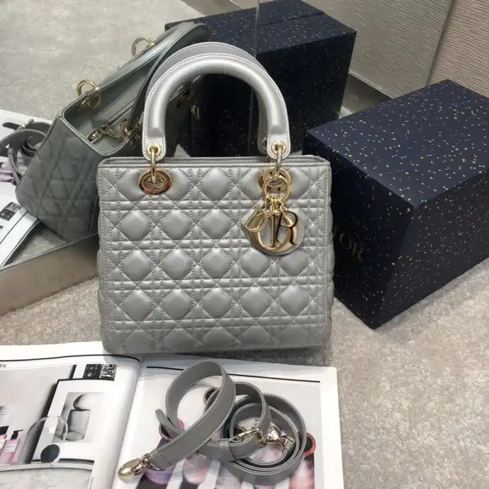 Introducing the exquisite Lady Dior Large in shimmering silver ✨—a timeless piece that radiates elegance and grace. Perfect for every occasion! 💖👜 https://tinyurl.com/2apnca5z