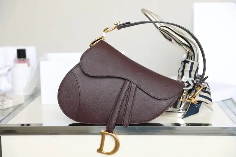 Embrace elegance with the Dior Saddle Bag in Bordeaux. A perfect blend of style and charm, it complements every moment. 💖👜✨ https://tinyurl.com/22q8zhck