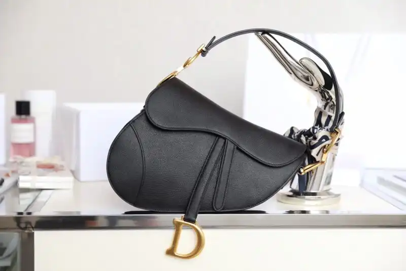 Discover the elegance of the Dior Saddle Bag in timeless black. A perfect companion for your everyday adventures. 🖤✨👜 https://tinyurl.com/23yef5dk