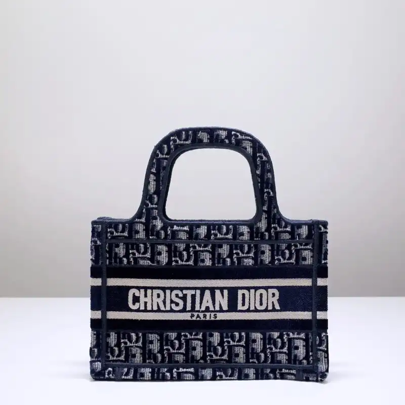Discover the enchanting Dior Tote Book Mini in serene blue. Perfect for any occasion, it’s a lovely addition to your collection. 💖✨👜 https://tinyurl.com/29omnebx