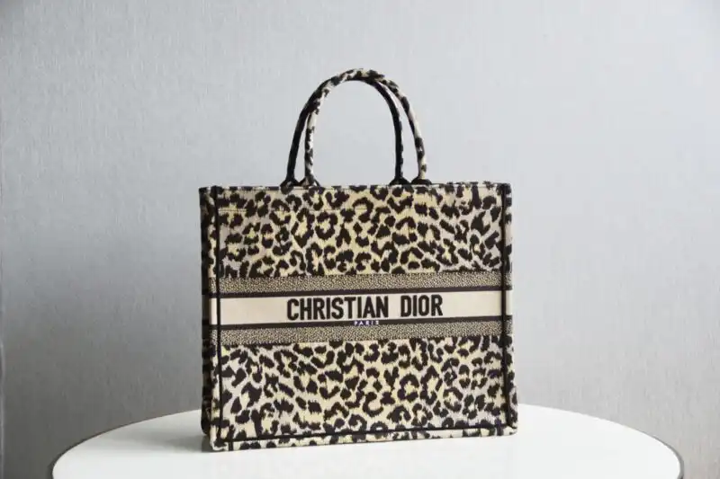 Discover the elegance of the Dior Tote Book in stunning leopard print. Perfect for adding a touch of wild charm to your day! 👜✨🐆💖 https://tinyurl.com/2c5552bv