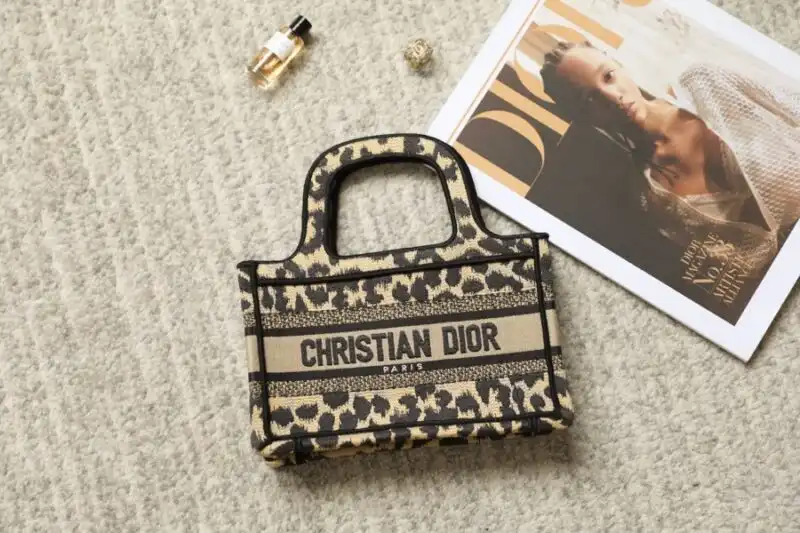 Embrace elegance with the Dior Tote Book Mini in chic leopard print. A delightful companion for your stylish adventures! 👜✨🌿 https://tinyurl.com/24blkdp9