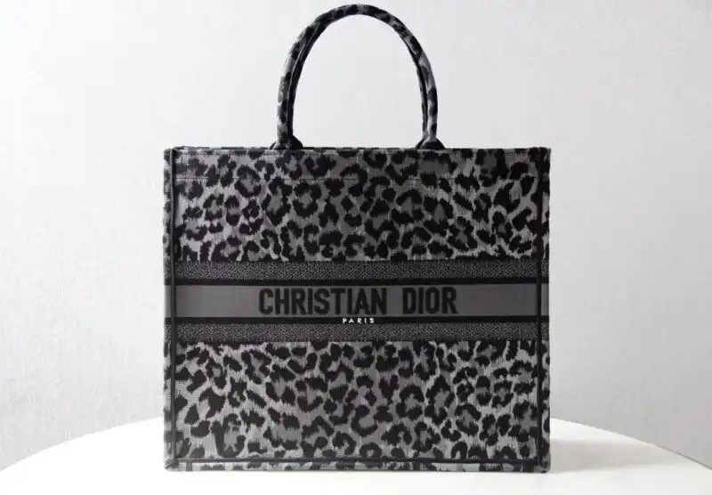 Discover elegance with the Dior Tote Book Leopard in Grey. Perfect for any occasion, it combines style and grace effortlessly. 👜✨🌿 https://tinyurl.com/25urko5o