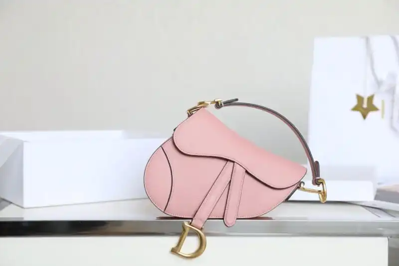 Discover the enchanting Dior Saddle Bag in delicate pink 🌸✨—a perfect blend of elegance and charm for your everyday adventures! 💖 https://tinyurl.com/2doaf4fm