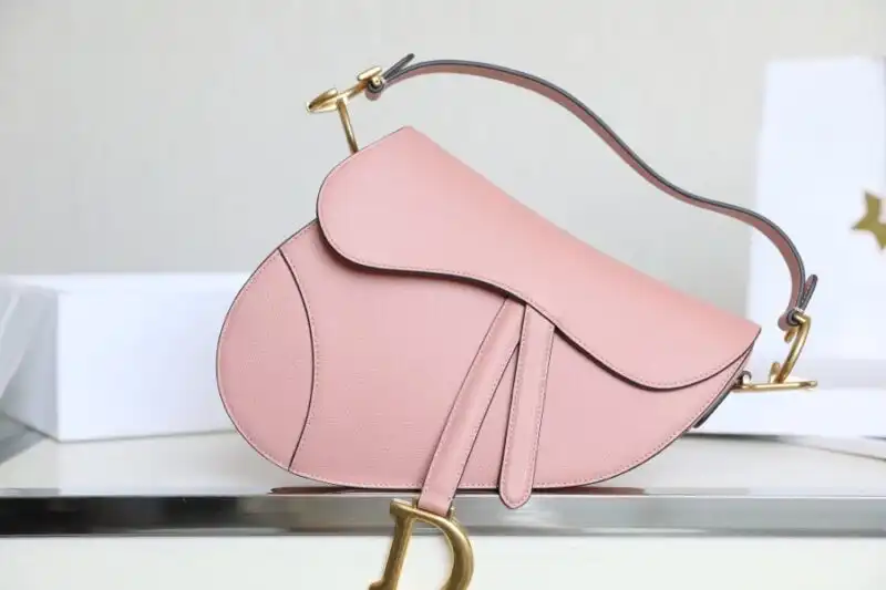 Discover the enchanting Dior Saddle Bag in soft pink, a perfect blend of elegance and charm. Embrace your style with love! 💖✨👜 https://tinyurl.com/24zzy4ec