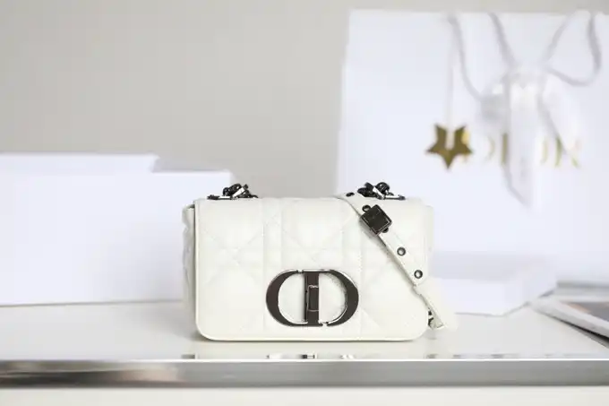 Elevate your style with the Dior Caro Bag in White Gunmetal. A perfect blend of elegance and charm awaits you! ✨🤍👜 https://tinyurl.com/2bhycp23