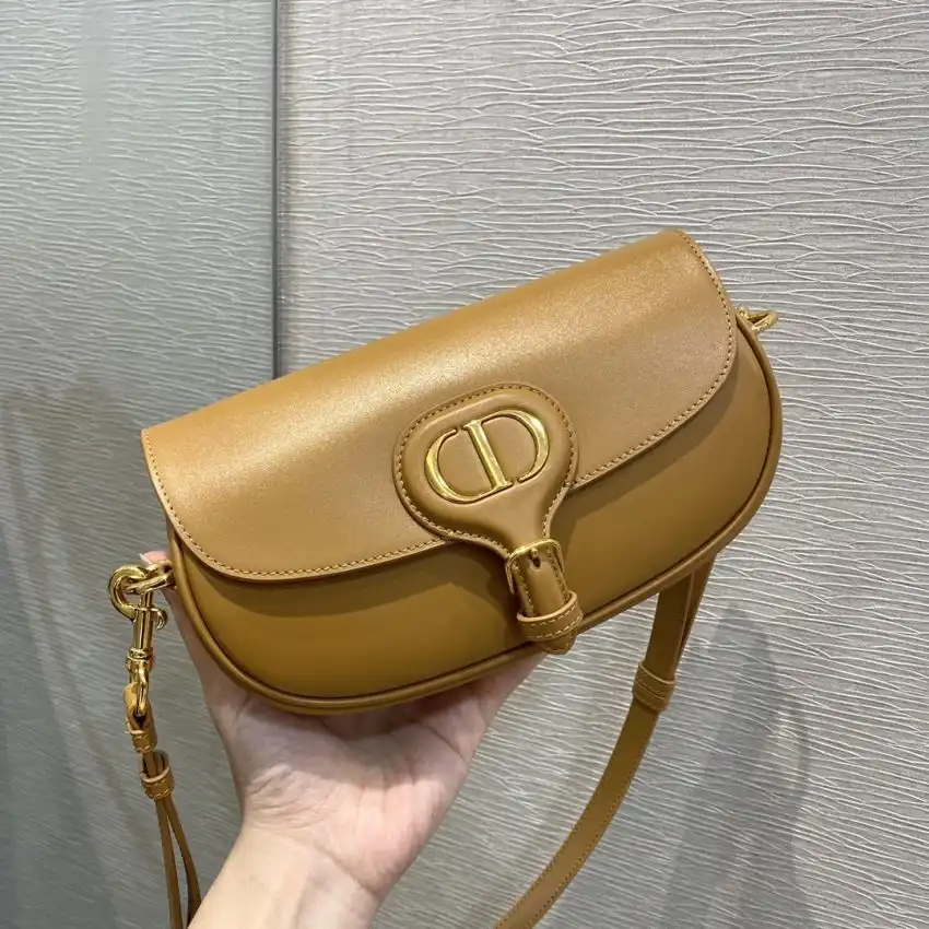 Discover the elegance of the Dior Bobby East-West in a lovely brown hue. Perfect for any occasion! ✨💖👜 https://tinyurl.com/2dprjd7v