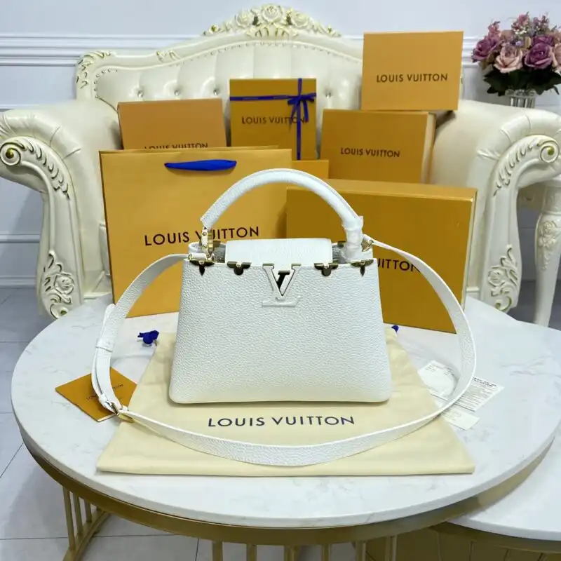 Discover the elegance of the Louis Vuitton Capucines in a serene white hue. A timeless piece for your collection! ✨🤍👜 https://tinyurl.com/283pxgg3