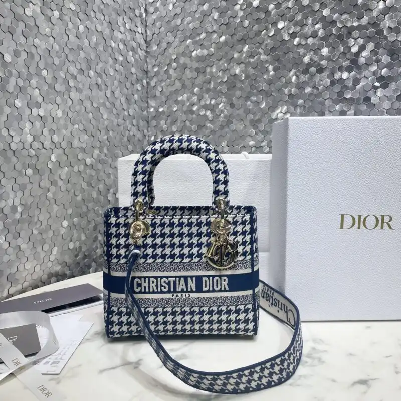 Discover the elegance of the Lady Dior Medium D-Lite Houndstooth Canvas. A perfect blend of style and sophistication. 🌟👜✨ https://tinyurl.com/2y78eu47