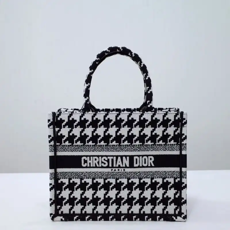 Elevate your style with the Dior Tote Book in houndstooth. A perfect blend of elegance and charm. 🌼👜✨ https://tinyurl.com/23dolzrt