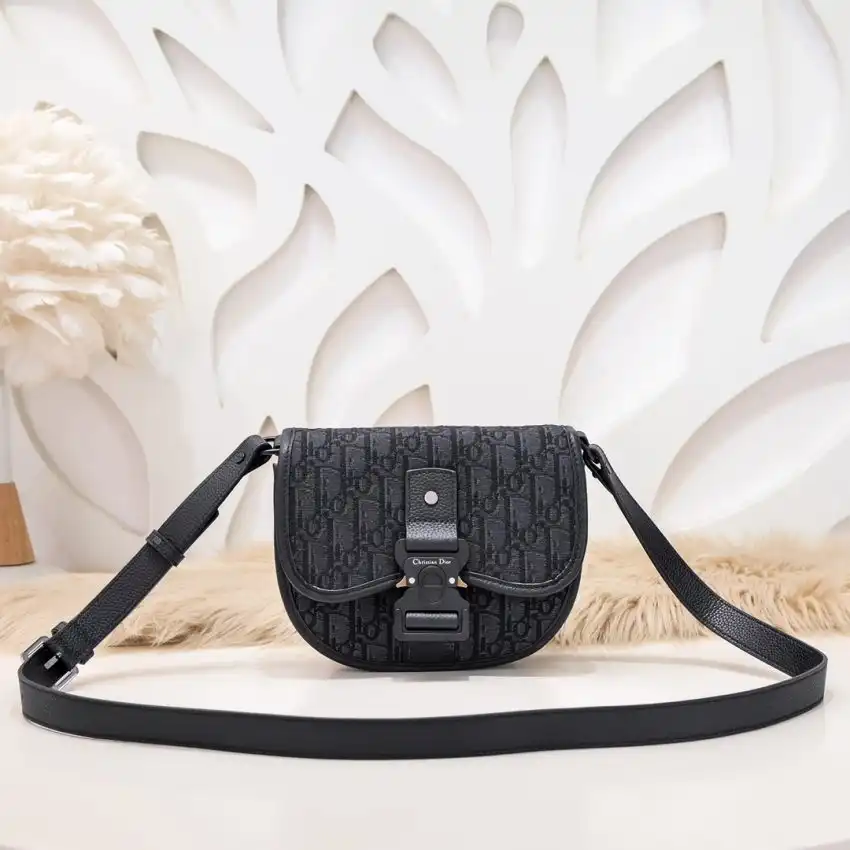 Discover elegance with the Dior Mini Gallop Bag in black canvas. Perfect for any occasion, it’s a timeless addition to your collection. 🖤✨👜 https://tinyurl.com/26vtt7p8