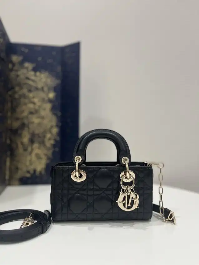 Discover the exquisite Dior Lady D-Joy Mini Bag in classic black—perfectly charming for any occasion. Elevate your elegance! ✨🖤🌸 https://tinyurl.com/2228feka