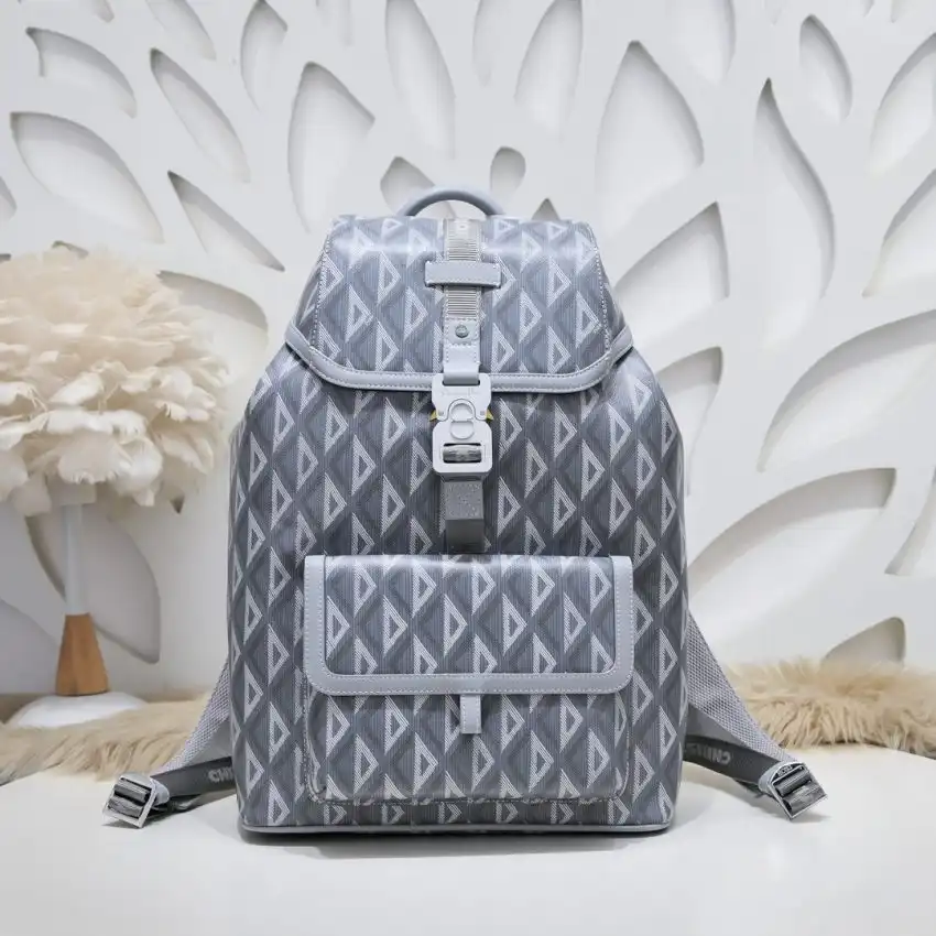 Discover elegance on the go with the Dior Hit The Road Backpack in Diamond Grey. Perfect for your adventures! ✨💖🎒 https://tinyurl.com/2yaocjgl
