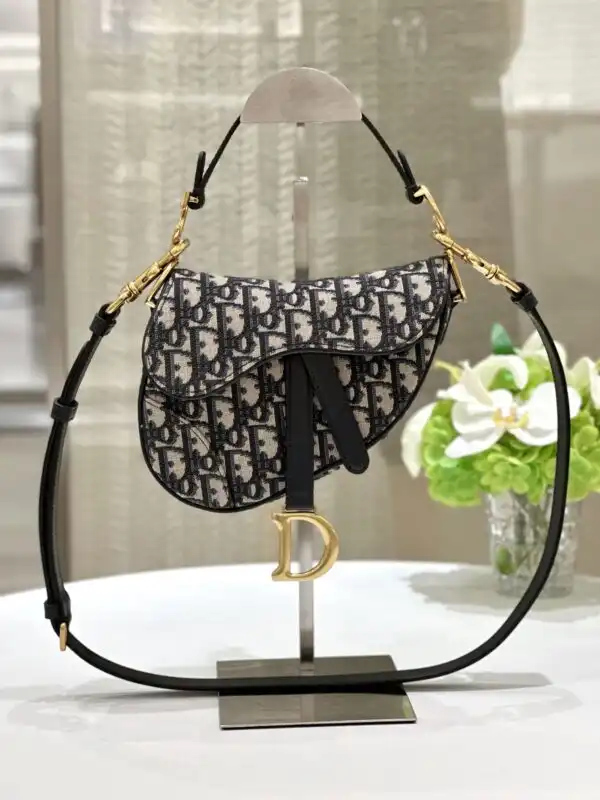 Discover the elegance of the Dior Saddle Bag Small in stunning CD Canvas. A perfect blend of style and grace! 🌸✨👜 https://tinyurl.com/242t7g85