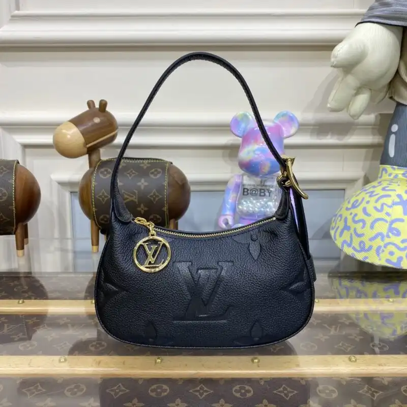 Discover the elegance of the Louis Vuitton Mini Moon in black. A timeless piece that brings joy to every outfit. ✨👜💕 https://tinyurl.com/22dw6zfh