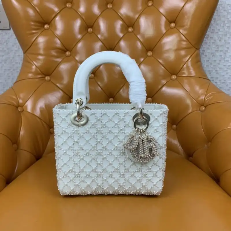 Introducing the Lady Dior White Pearl: a timeless elegance that sparkles with grace, perfect for every cherished moment. ✨🤍✨ https://tinyurl.com/2ylu63jn