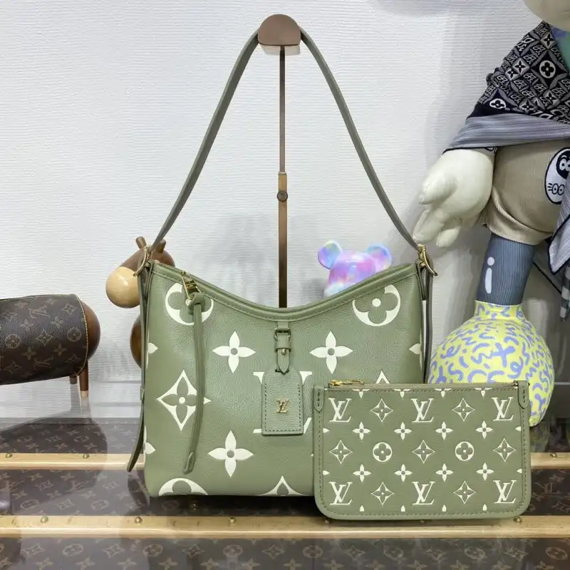 Discover the elegance of the Louis Vuitton Carry All in a soothing green hue. Perfect for every occasion! 🌿👜✨ https://tinyurl.com/2dytw5wn