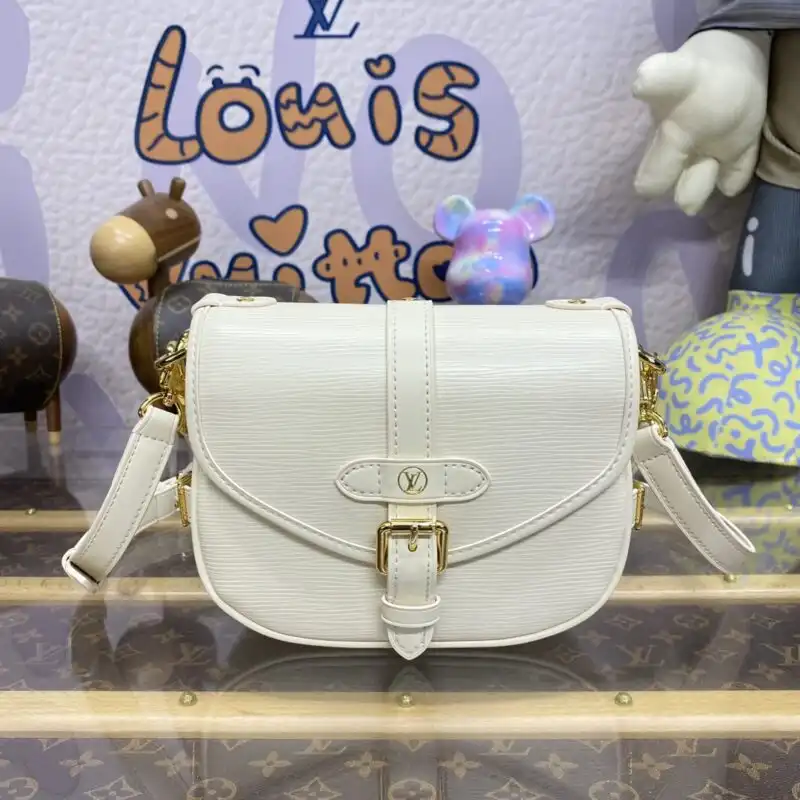 Discover the timeless elegance of the Louis Vuitton Saumur in a soft white hue. A perfect companion for every journey! ✨👜💖 https://tinyurl.com/22nvf7ru