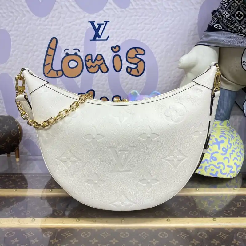 Discover the elegance of the Louis Vuitton Loop Hobo in soft white. Perfect for any occasion, it radiates timeless charm! ✨👜💖 https://tinyurl.com/2dfeuf97