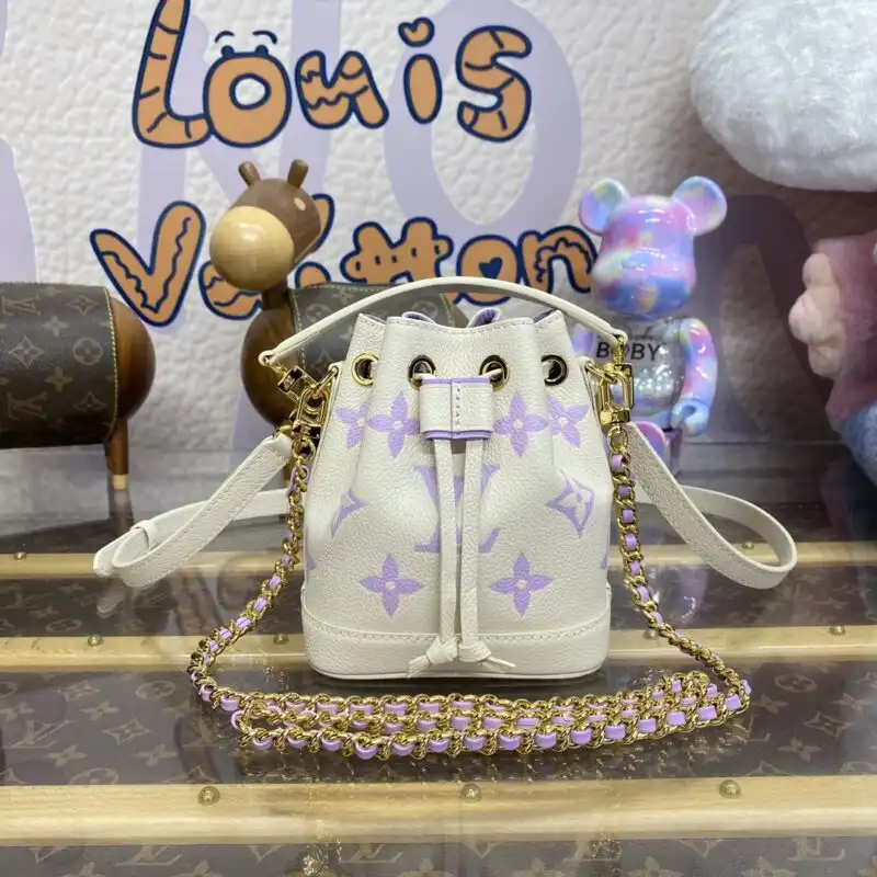 Discover the elegance of the Louis Vuitton Nano Noe in soft white and purple. Perfect for every occasion! 💖✨👜 https://tinyurl.com/2bhxdfmp