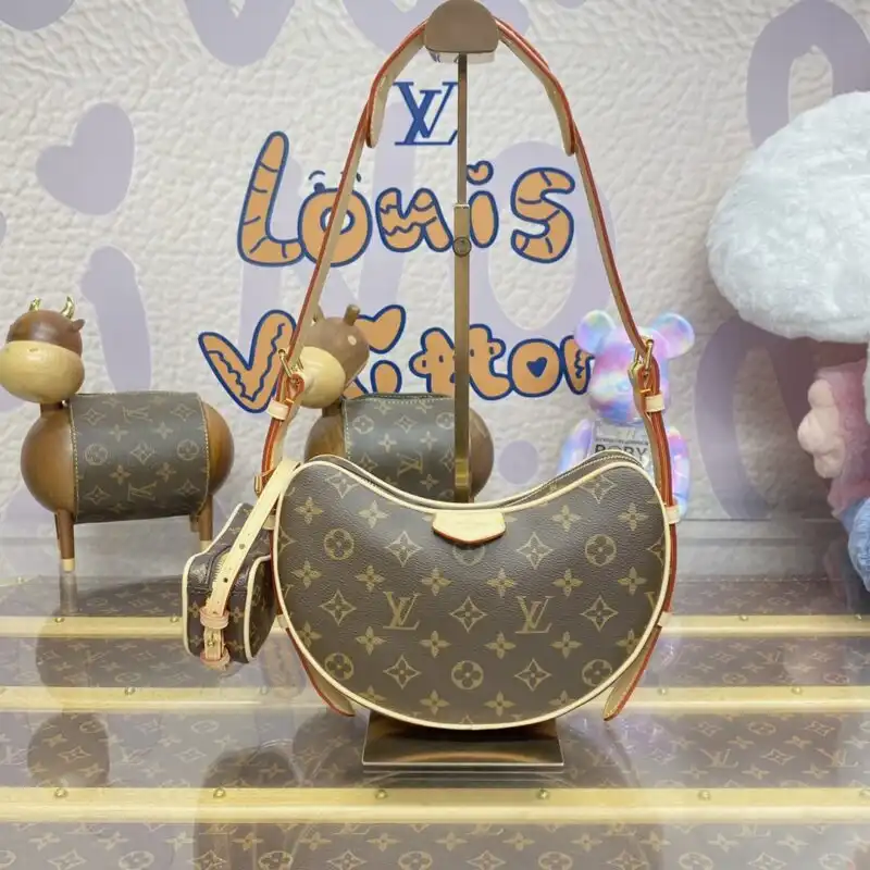 Discover the timeless elegance of the Louis Vuitton Croissant in warm brown hues. Perfect for every occasion, it embraces your style with love. 💖👜✨ https://tinyurl.com/2b5abydk