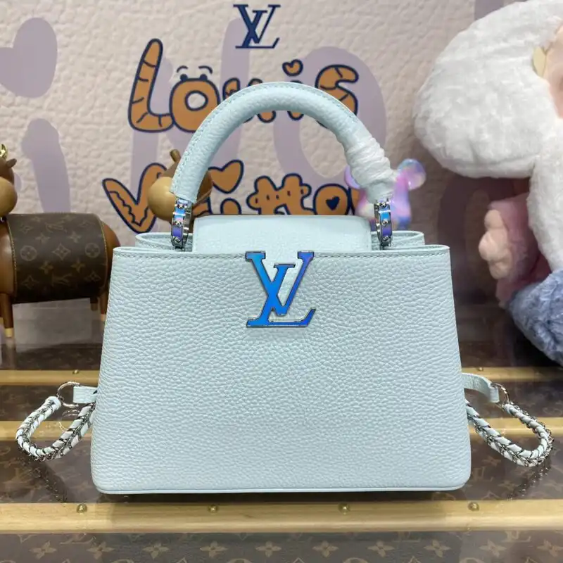 Discover the elegance of the Louis Vuitton Capucines in soothing blue. A timeless piece that brightens your day! 💙✨👜 https://tinyurl.com/2xmu82gp