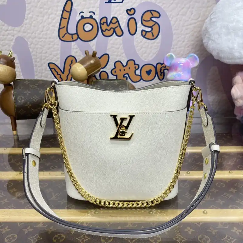Discover the elegance of the Louis Vuitton Lock and Walk in soft beige. A timeless piece for your cherished moments. ✨👜💖 https://tinyurl.com/26b89jms