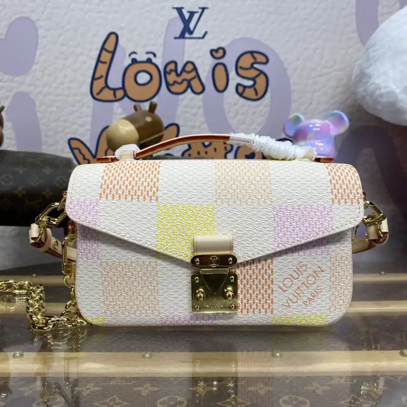 Discover the elegance of the Louis Vuitton Pochette Metis East West in a lovely pink grid. Perfect for any occasion! 💖✨👜 https://tinyurl.com/29bnbkxt