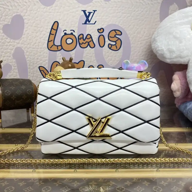 Discover the elegance of the Louis Vuitton Go-14 in white. A timeless piece that adds a touch of sophistication to any outfit. ✨👜❤️ https://tinyurl.com/2bo46sux