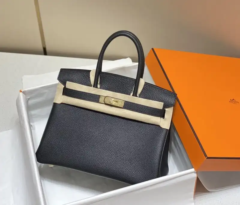 Discover the timeless elegance of the Hermes Birkin in classic black and gold. A treasure for your collection! ✨👜💖 https://tinyurl.com/2439598y