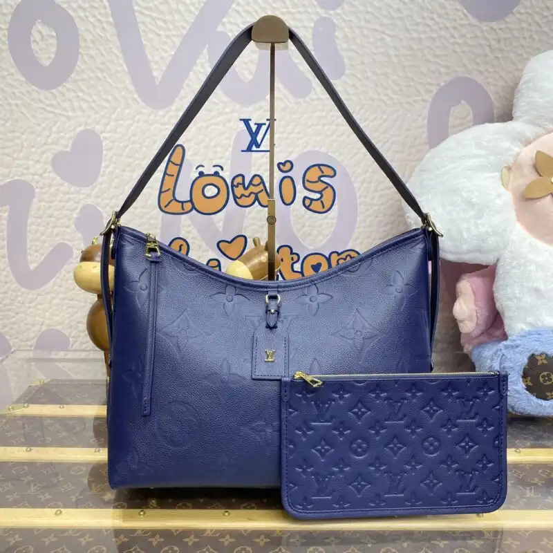 Discover the elegance of the Louis Vuitton Carry All MM in rich dark blue. Perfect for your journey, with style and grace. 💙✨👜 https://tinyurl.com/2cyzjv6g