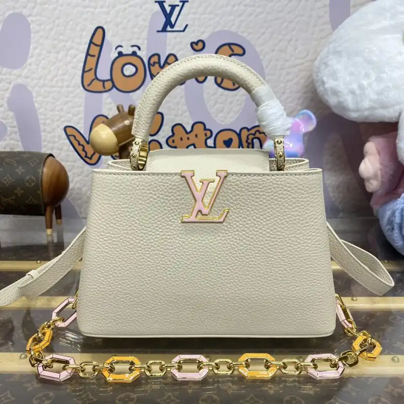 Discover the elegance of the Louis Vuitton Capucines in soothing beige—a timeless piece that radiates grace and sophistication. 🌟👜✨ https://tinyurl.com/28yx35ca