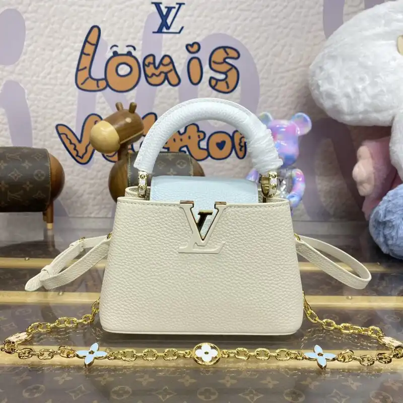 Discover the elegance of the Louis Vuitton Capucines in soothing beige and blue. A timeless piece to cherish forever. 💖✨👜 https://tinyurl.com/23dew7p9