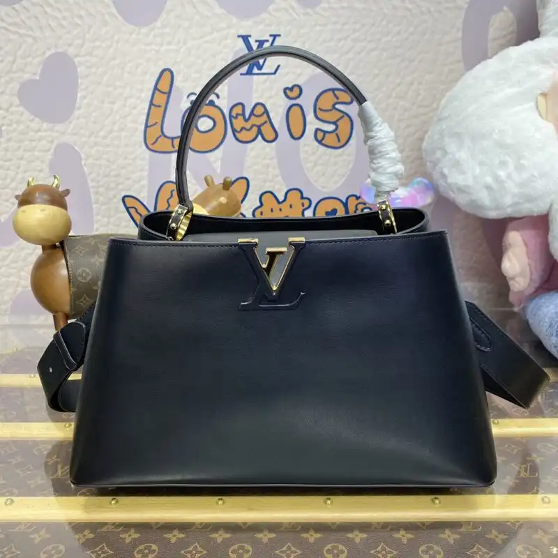 Discover elegance with the Louis Vuitton Capucines Large in Black. A timeless companion for your stylish adventures. ✨👜💕 https://tinyurl.com/237qyauq