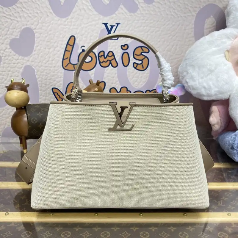Experience the elegance of the Louis Vuitton Capucines in soothing beige silk. A timeless piece that whispers luxury and grace. ✨💖👜 https://tinyurl.com/22jj4hdt