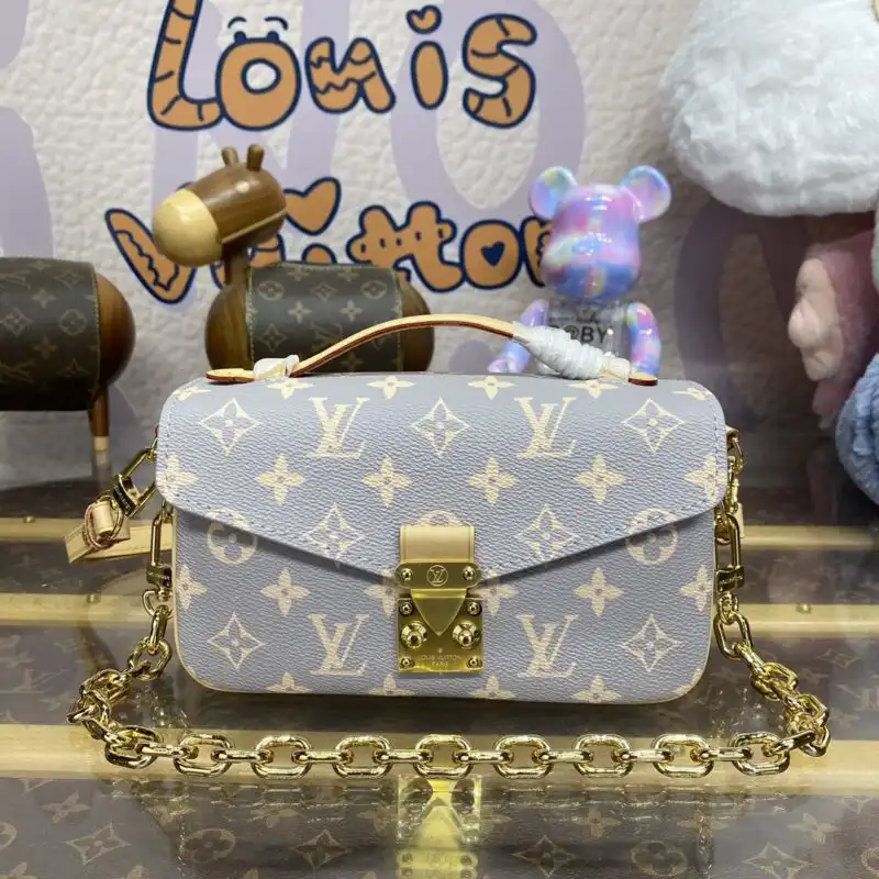Discover the elegance of the Louis Vuitton Pochette Metis East West in a soft grey. Perfect for any occasion! 🌟👜✨ https://tinyurl.com/22xz5xgu