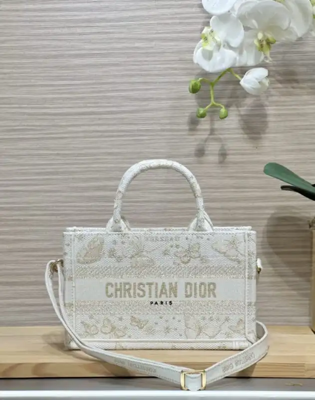 Discover the exquisite Dior Tote Book Mini Kingdee—a perfect blend of elegance and charm. Elevate your style with love. 💖👜✨ https://tinyurl.com/2b36majw