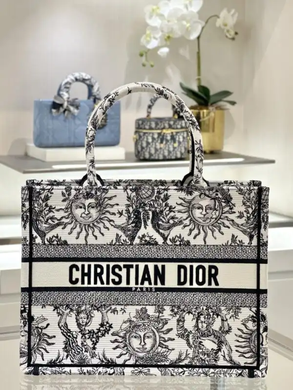 Discover the elegance of the Dior Tote Book in timeless black and white. Perfect for every occasion! 🌼👜✨ https://tinyurl.com/24t6vvld