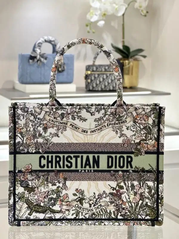 Embrace the beauty of autumn with the Dior Tote Book Sunflower, a gentle reminder of warmth and style this season. 🌻🍂✨ https://tinyurl.com/24erw5to