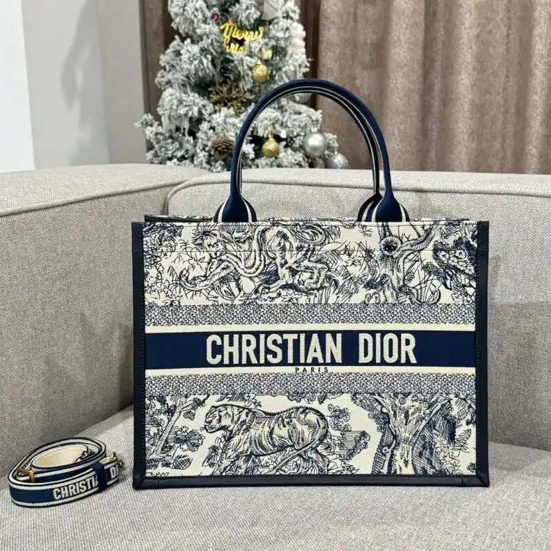 Elevate your style with the exquisite Dior Tote Book in White Tiger leather. A perfect blend of elegance and charm. 🐅✨👜 https://tinyurl.com/2bzfj4pb