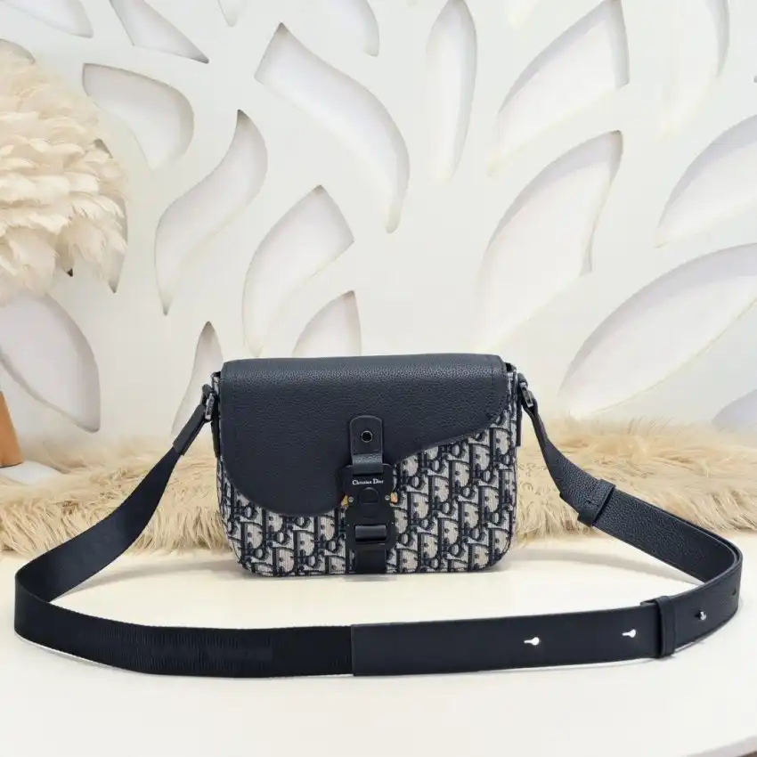 Discover the elegance of the Dior Saddle Messenger Bag in iconic Oblique, where style meets practicality. ✨👜 Perfect for every occasion! 💖 https://tinyurl.com/298pvl9x