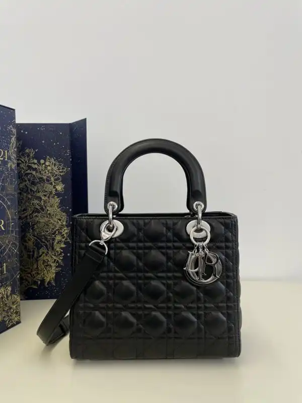Discover elegance with the Lady Dior Large in Black Silver. A timeless companion for every moment, exuding grace and sophistication. ✨👜❤️ https://tinyurl.com/25txarfh