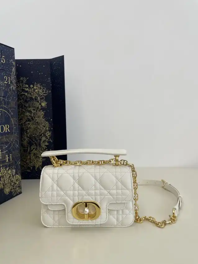 Introducing the Dior Jolie Top Handle in elegant white 🌼✨. A perfect blend of sophistication and charm for your every occasion! 💖👜 https://tinyurl.com/2awc9efb