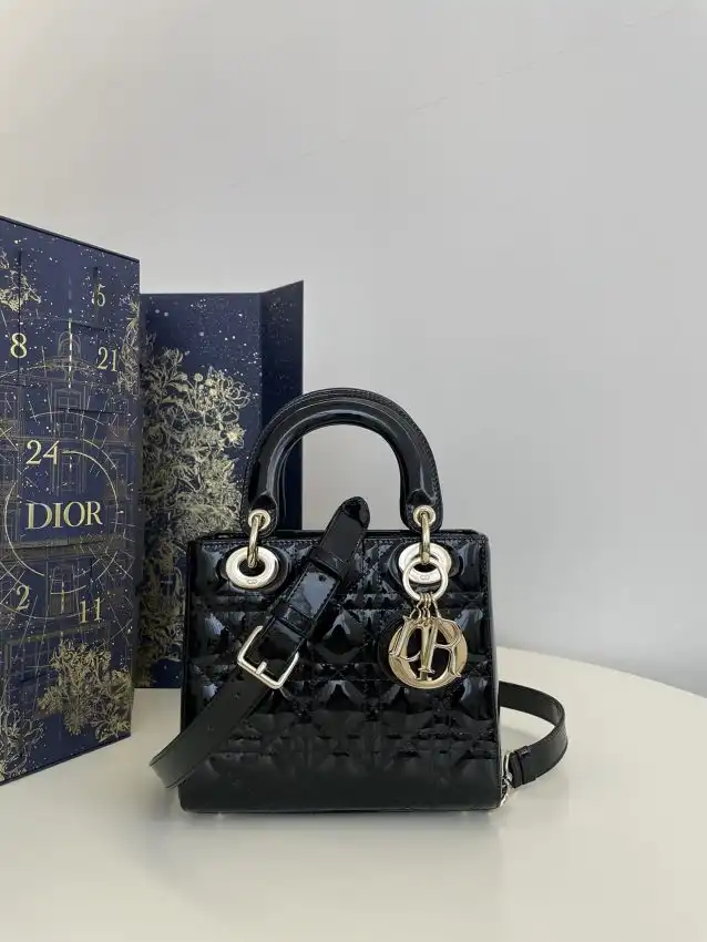 Discover the elegance of the Lady Dior Mini in black patent. A timeless piece that adds a touch of glamour to any outfit! 🖤✨👜 https://tinyurl.com/22p8rgoy