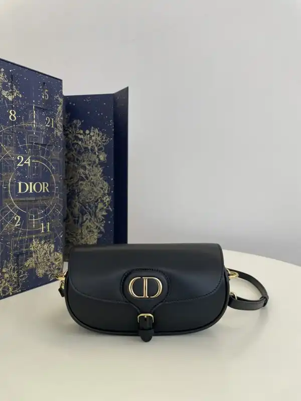 Discover the elegance of the Dior Bobby East-West in timeless black. A perfect blend of style and grace awaits you! 🖤✨👛 https://tinyurl.com/242k3r2d